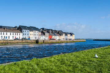 Colorful houses in the quay of the Claddagh area, formerly a fishing village, where the the mouth...