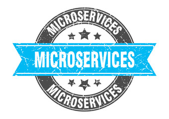 Fototapeta premium microservices round stamp with ribbon. label sign