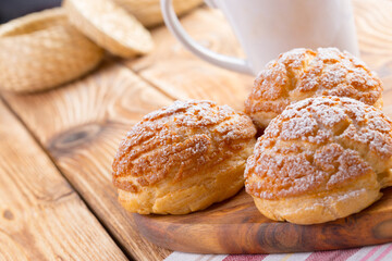 Heap of oat cookies on wooden board