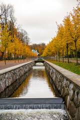 Fototapeta na wymiar Autumn view of water canal in Kadriorg park, Tallinn, Estonia