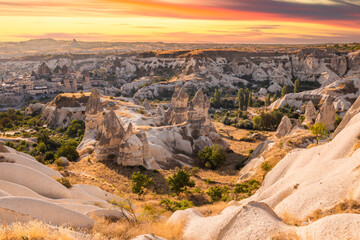 Fototapeta na wymiar Rocky landscape in Cappadocia at sunset, Turkey. Travel in Cappadocia