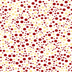 Red and beige circles on a white background. Vector pattern. Geometric pattern for the fabric. Textile background.