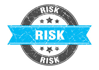 risk round stamp with ribbon. label sign