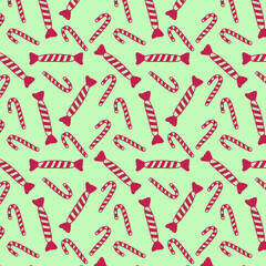 pink Christmas sweets and candies on a green background seamless pattern 