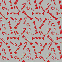 Christmas sweets and candies on a gray background seamless pattern 