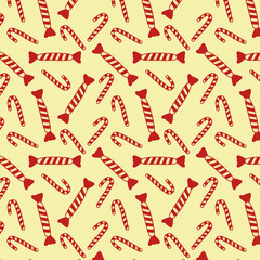 Christmas sweets and candies on an yellow background seamless pattern 