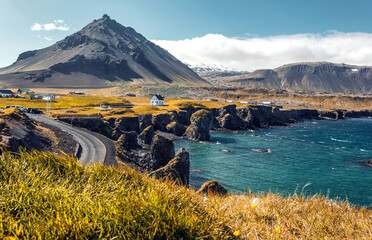 Panoramic view on Impressive Icelandic seascape. Majestic Stykkisholmur rocky fjords at sunset. Snaefellsnes peninsula. Amazing Iceland. Arnarstapi village popular travel and hiking destination place