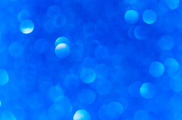blue abstract bokeh background, creative design. holiday decoration.