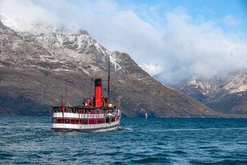 Old steam boat on the Lake Wakatipu, Queenstown, New Zealand - 378751476