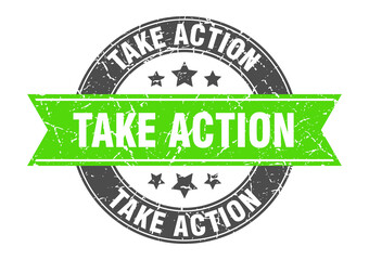 Obraz premium take action round stamp with ribbon. label sign
