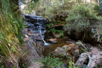 Waterfall in the middle of the forest on the route of the waterfalls in Covaleda, Soria, Spain