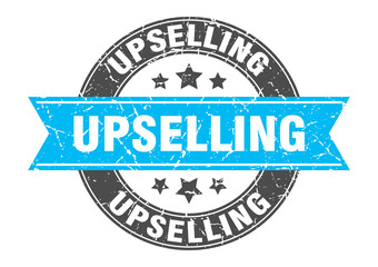 Fototapeta premium upselling round stamp with ribbon. label sign