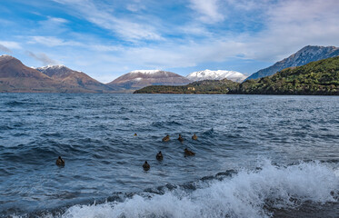 Lake Wakatipu in the mountains of Queenstown, New Zealand - 378752868