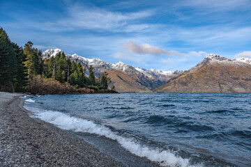 Lake Wakatipu in the mountains of Queenstown, New Zealand - 378753047