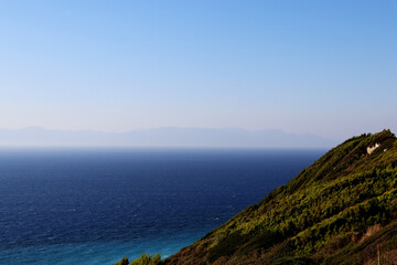 Mountains with sea view and clear blue sky