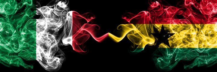 Italy vs Ghana, Ghanaian smoky mystic flags placed side by side. Thick colored silky abstract smoke flags of Italian and Ghana, Ghanaian