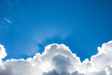 A blue sky background with clouds