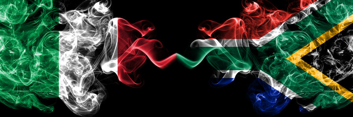 Italy vs South Africa, African smoky mystic flags placed side by side. Thick colored silky abstract smoke flags of Italian and South Africa, African