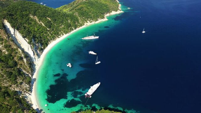 Aerial drone video of beautiful paradise turquoise sea sandy beach and bay of Gidaki accessible by short hiking in beautiful Ionian island of Ithaki or Ithaca, Greece