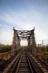 Abandoned railway bridge over the Dnieper river in Kherson, Ukraine.