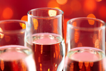 Close up photo of Champagne glasses against bokeh background