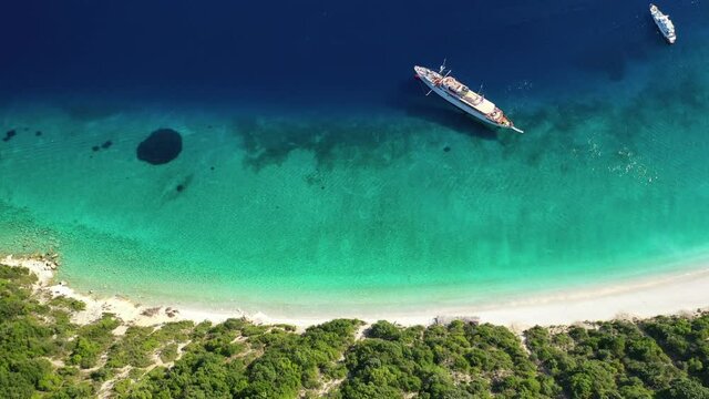 Aerial drone video of beautiful paradise turquoise sea sandy beach and bay of Gidaki accessible by short hiking in beautiful Ionian island of Ithaki or Ithaca, Greece