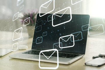 Creative abstract postal envelopes sketch on modern laptop background, e-mail and marketing concept. Double exposure