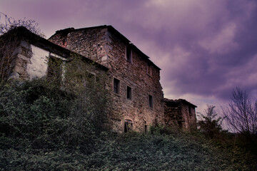 Fototapeta na wymiar abandoned strage house in the mountains