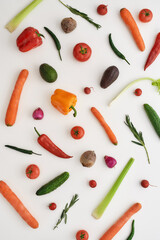 Top view of various colorful vegetables and spices for cooking and health isolated over white background