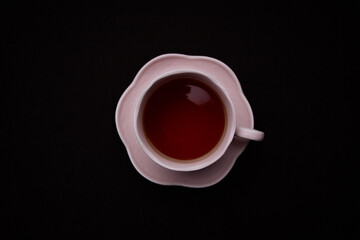 Ceramic Tea Cup on Black Background