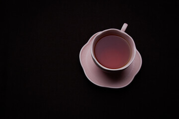 Ceramic Tea Cup on Black Background
