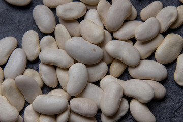 Natural white bean closeup background.