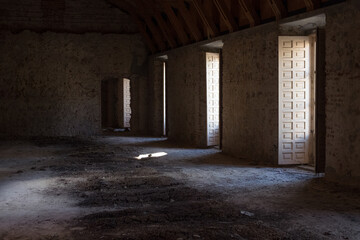 Beautiful hall with three windows in an abandoned palace