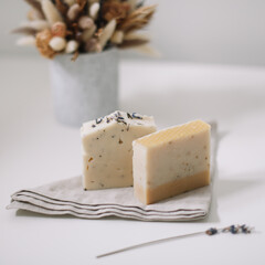 Handmade natural soap bars on white background. Soap making. copyspace, flat lay, top view