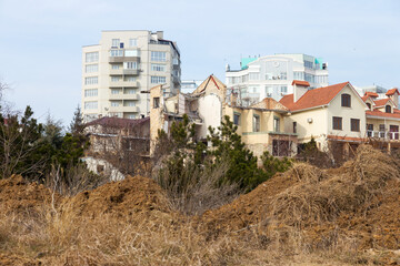 landslide caused by torrential rains of hurricane CHRISTIE. Broken road asphalt cracked, and came down with landslide. Destroyed residential buildings of cottage town elite settlement. earthquake