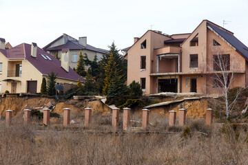 landslide caused by torrential rains of hurricane CHRISTIE. Broken road asphalt cracked, and came down with landslide. Destroyed residential buildings of cottage town elite settlement. earthquake