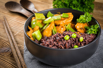 Thai red curry with chicken and black rice.