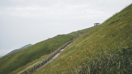 Fototapeta na wymiar Footpath on side of mountain ridge on Wugong Mountain in Jiangxi, China