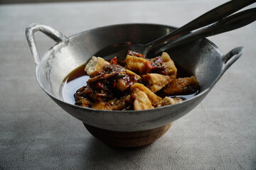 Tofu gejrot or Tofu, is a traditional Indonesian snack, the fried tofu is very tasty served with chili sauce