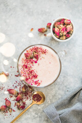 Obraz na płótnie Canvas Pink matcha latte with milk. Trendy beverage. Christmas drink