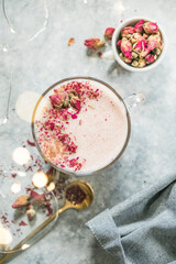 Pink matcha latte with milk. Trendy  beverage. Christmas drink