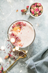 Pink matcha latte with milk. Trendy  beverage. Christmas drink