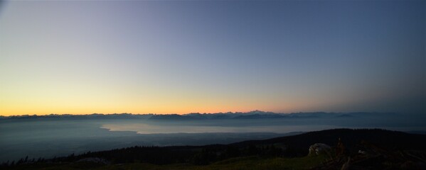 Fototapeta na wymiar Panorama of the sunrise on the Monte Tendre mountain