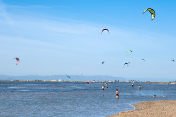 Kite surfing at Trabucador Beach, Spain. South Europe touristic destination.