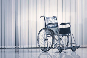 Fototapeta na wymiar Wheelchair for hospital patients. Selective focus
