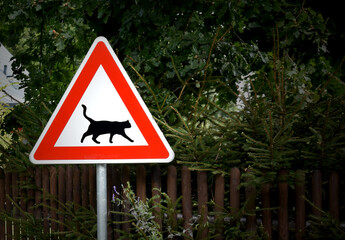 Red triangular road sign warning cats stock images. Cat crossing warning sign stock photo. Cat caution road sign images