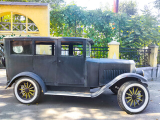 Beautiful shiny old model black car © Anna