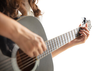 Close up of guitarist hand playing guitar, macro shot. Concept of advertising, hobby, music, festival, entertainment. Person improvising inspired. Copyspace to insert image or text.