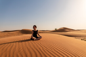 With eyes closed and a posture of tranquility, she is engaged in a deep state of meditation,...