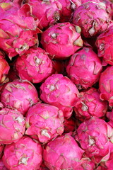 Dragon fruits sold in an Asian street market stall